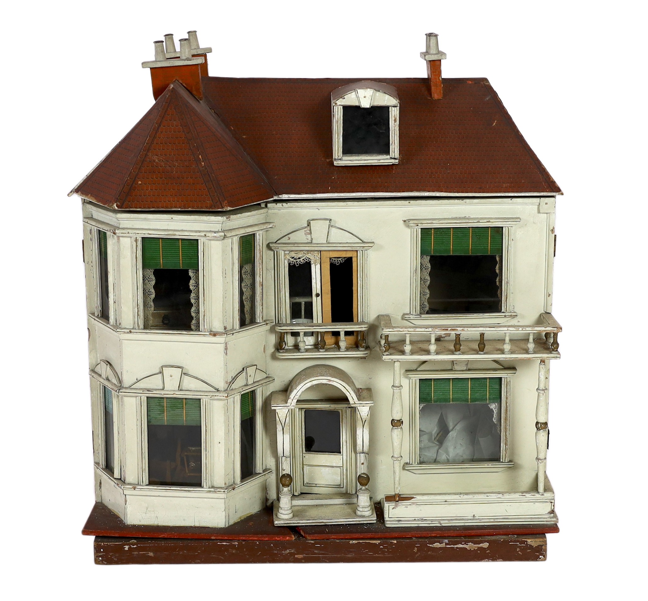 A G. and J. Lines furnished dolls’ house of 'Kits Koty' type, early 20th century, 92cm high.